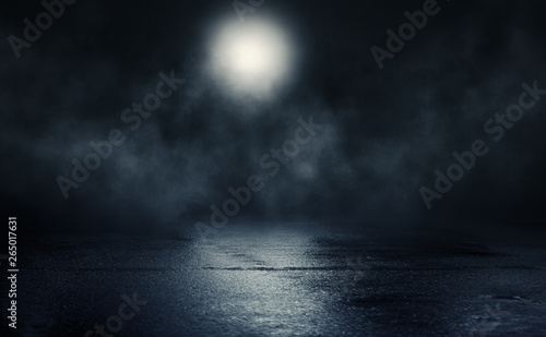Empty background scene. Reflection of the moon on a wet surface. Rays of blue neon light in the dark. Night view of the street, the city. Abstract dark background.