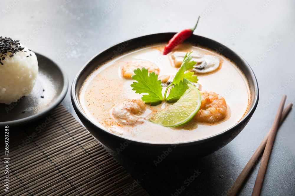 Tom yam kung thai soup with shrimp, seafood, coconut milk, chili pepper and rice. Tom yam kung thai soup with shrimp, seafood, coconut milk, chili pepper and rice.