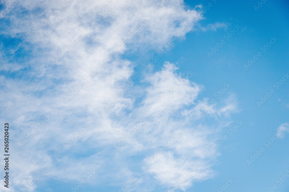 Blue sky with cirrocumulus white clouds. Sky background
