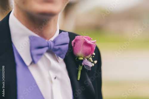 Groom in tuxedo with boutonniere