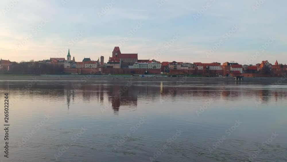 Torun old town reflected in Vistula river, Poland Torun old town reflected in Vistula river, Poland