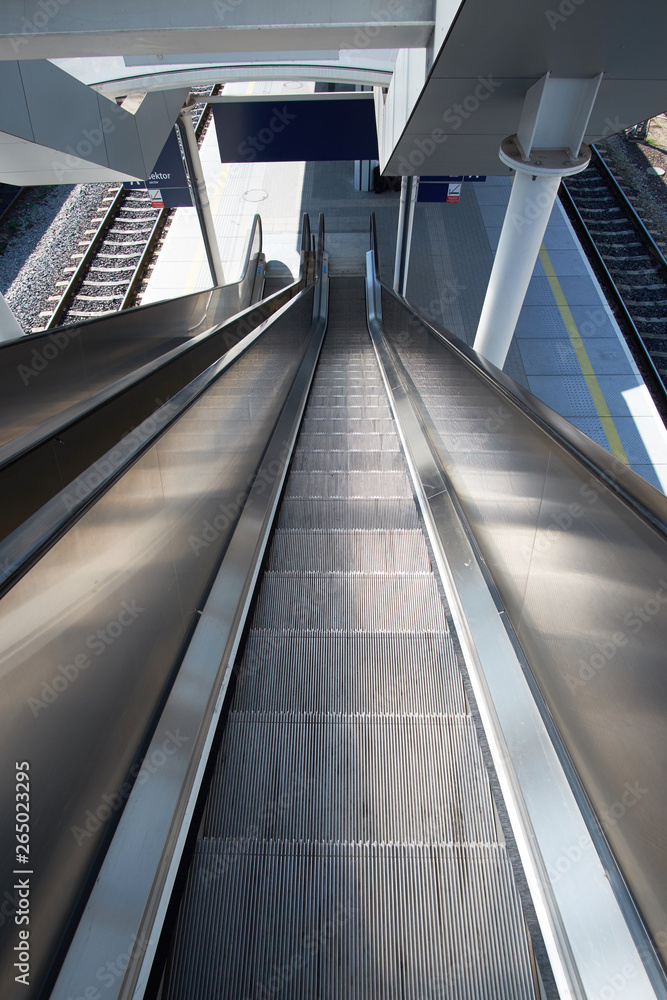 Fototapeta premium perspective view on escalator on railway station