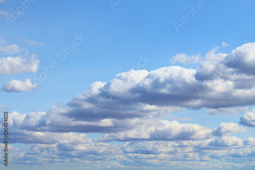 Beautiful cumulus clouds. Horizontal view. Background. Landscape. © far700