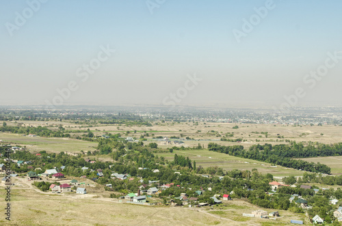 Numerous villages and private houses near the city of Almaty in Kazakhstan. Photographed from a bird's-eye view.