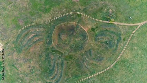 Historical monument of the ancient civilization mound Mavrinsky Maidan. Ukraine, Dnepropetrovsk region, Pavlograd district, village Mezhirich. Video aerial photo