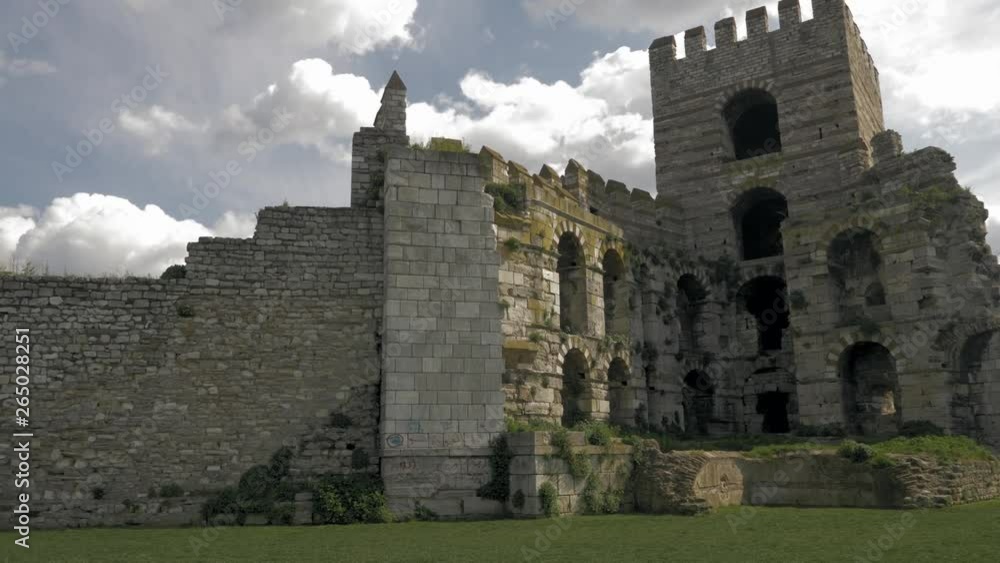 Beautiful fortress, sunny weather, the rays of the sun fall on the castle stems, nature, birds sing, near the lake with ducks Beautiful fortress, sunny weather, the rays of the sun fall on the castle stems, nature, birds sing, near the lake with ducks