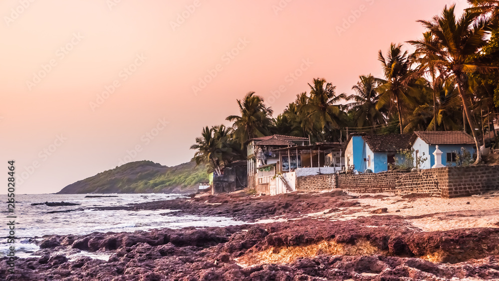 Φωτογραφία Sunset by the sea in the northern Goa at Anjuna beach, India