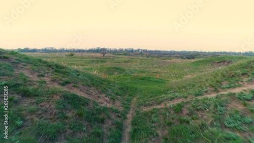 Historical monument of the ancient civilization mound Mavrinsky Maidan. Ukraine, Dnepropetrovsk region, Pavlograd district, village Mezhirich. Video aerial photo