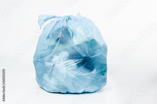 Plastic bottles in a blue garbage bag. Concept of caring for the environment, recycling. Secondary plastic circuit. Environment pollution.
