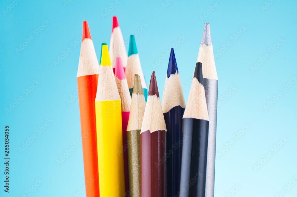 close-up image of colourful pencils over beautiful reverberation gradient background close-up image of colourful pencils over beautiful reverberation gradient background