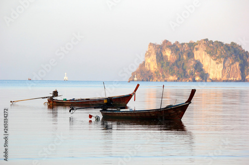 fishing boat in the sea with beautiful sky background