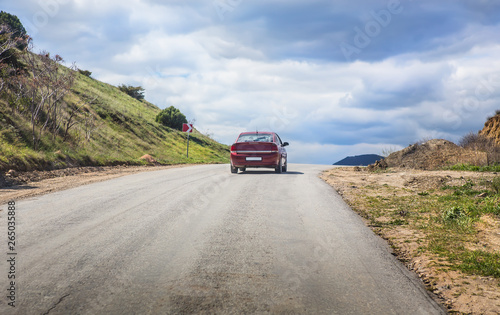 car moves on a mountain road