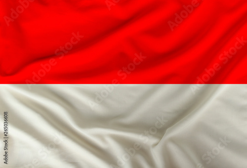 color indonesia national flag on draped textile, background