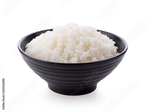 Rice in a black bowl on a white background