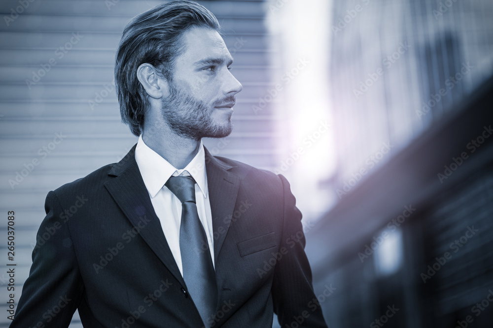 Blue toned image of an handsome businessman