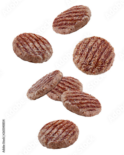 Falling grilled hamburger meat isolated on white background, clipping path, full depth of field photo