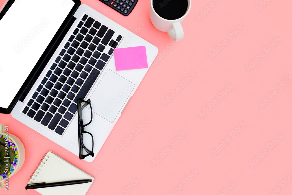 Flat lay office workspace with blank laptop, clipboard, top view laptop