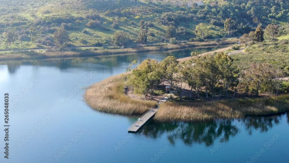 Aerial view of Miramar reservoir in the Scripps Miramar Ranch community, San Diego, California. Miramar lake, popular activities recreation site including boating, fishing, picnic & 5-mile-long trail. Aerial view of Miramar reservoir in the Scripps Miramar Ranch community, San Diego, California. Miramar lake, popular activities recreation site including boating, fishing, picnic & 5-mile-long trail.