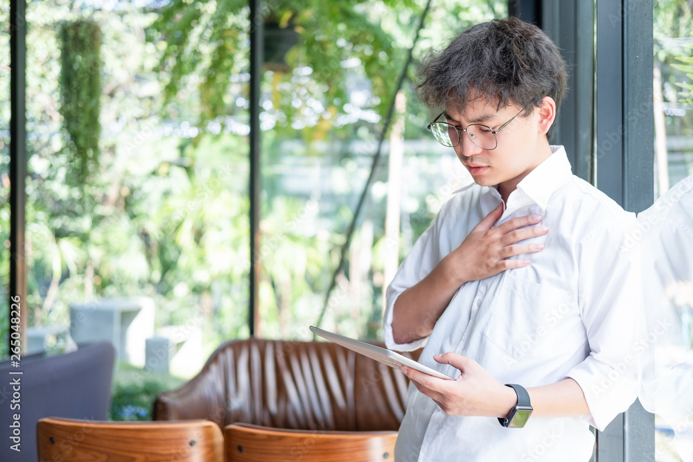 Businessman feel pain in their heart while working in the office, medical concept Businessman feel pain in their heart while working in the office, medical concept