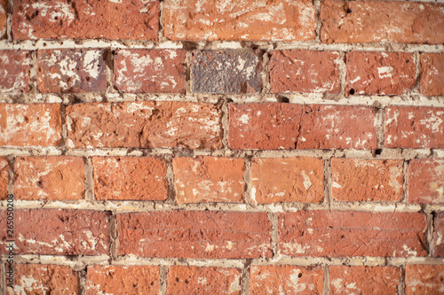 Textural bricks of historical brick wall