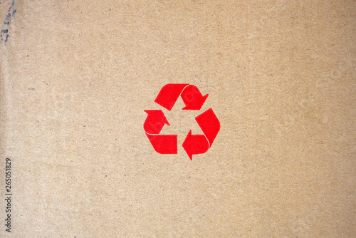 Close up Recycle Sign on Old Cardboard. photo