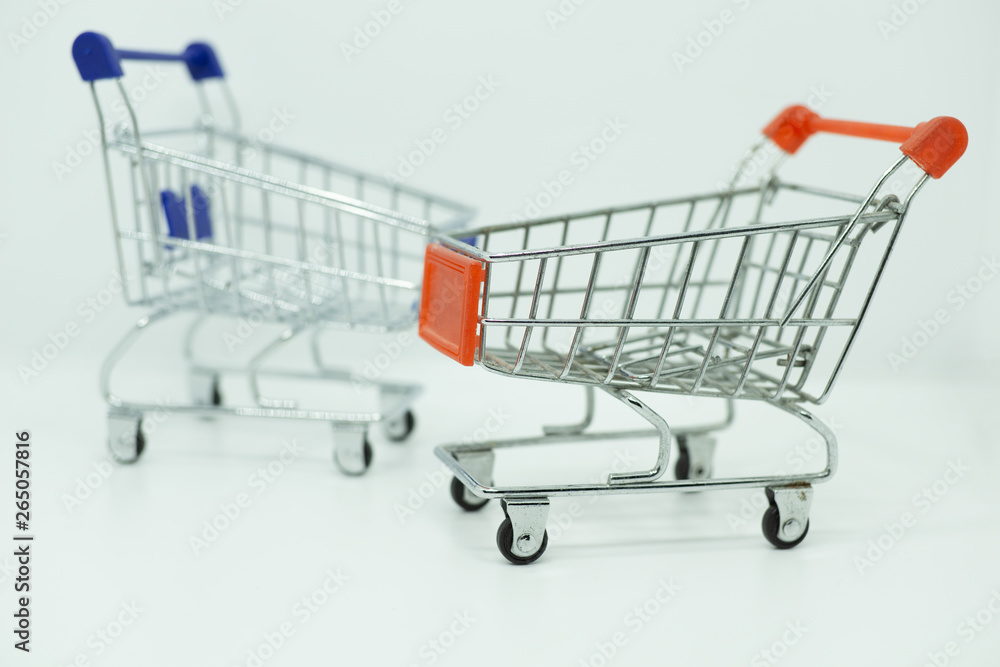 Shopping carts on white background with copy space. Shopping concept Shopping carts on white background with copy space. Shopping concept
