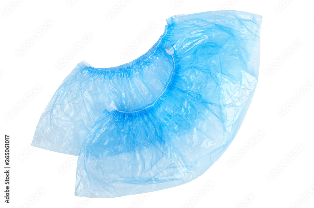 Obraz premium Two medical blue shoe covers overshoes isolated on white background. Catalog top view.