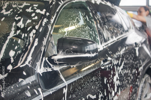 car wash. Detail of the machine in the foam close-up. the surface of the machine