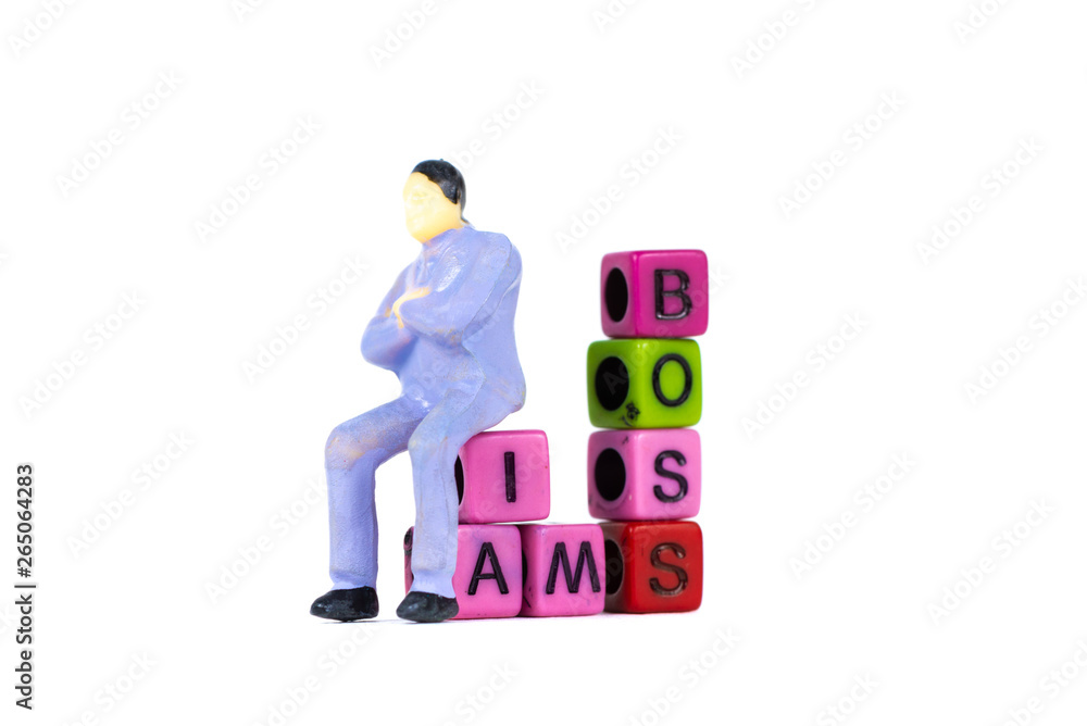 Businessman or manager or boss sitting on BOSS text made from colorful beads or letter bead on white background, finance and business concept. Businessman or manager or boss sitting on BOSS text made from colorful beads or letter bead on white background, finance and business concept.