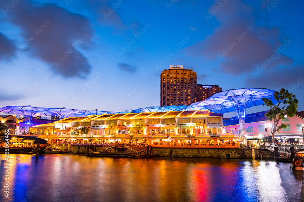 2019 March 1st, Singapore, Clarke Quay - City nightscape scenery of colorful the buildings along the river in the city.