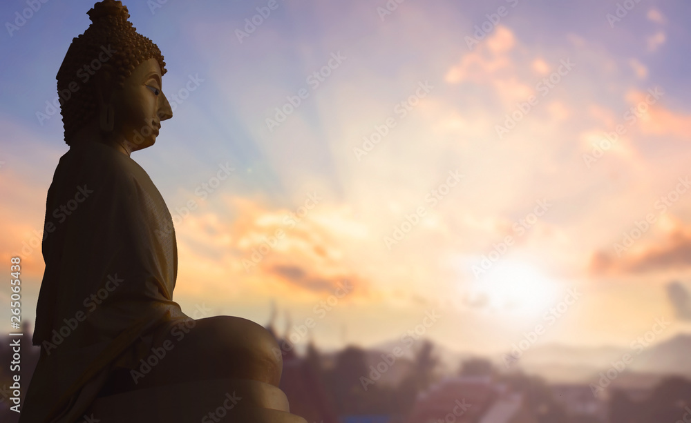 Buddhist concept: Vesak day Silhouette Buddha with blurred travel