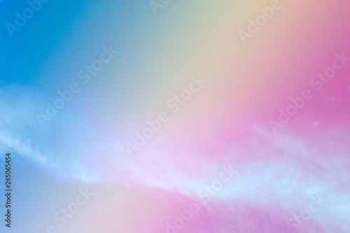 A soft fog cloud background white a pastel colored orage to blue gradient