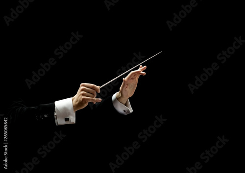 Foto Hands of conductor on a black background