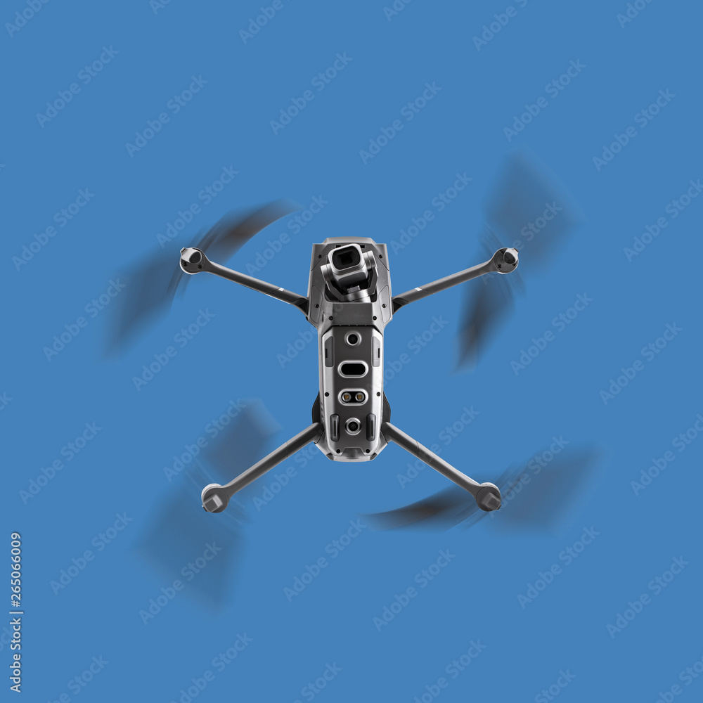 Drone in Flight over a blue sky background Drone in Flight over a blue sky background