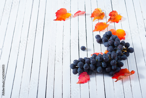 red grapes on white wood table