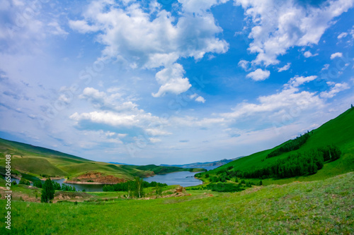 Landscape with mountains and clouds through a fisheye lens
