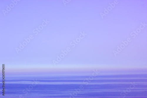 Beautiful blue and purple sunset over the sea © Olga