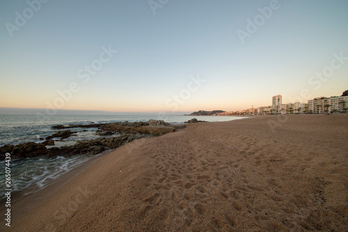 Sunrise on the beach of Lloret de Mar