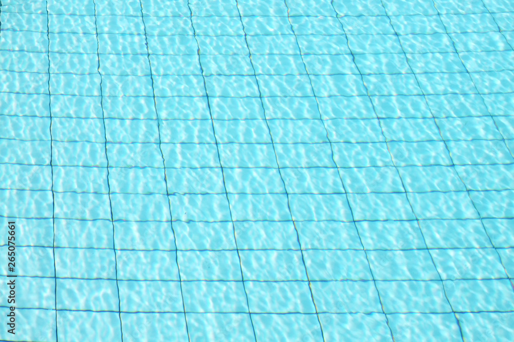 background of water in swimming pool. surface of blue swimming pool
