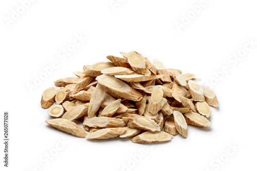 Pile of Astragalus  (Huang Qi) isolated on white background. Chinese herbal medicine. photo