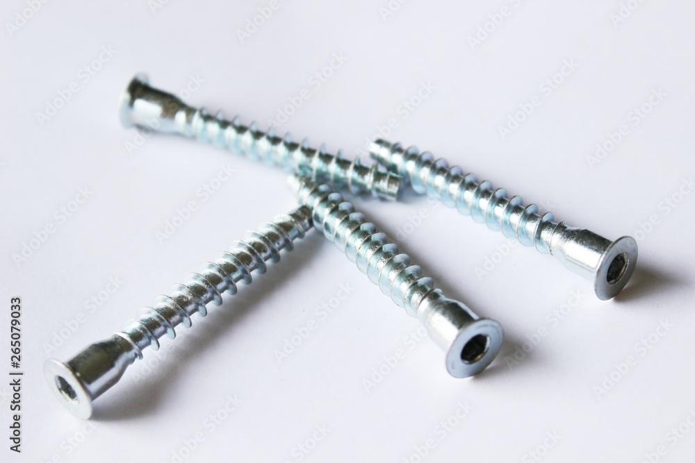 Screws on a white background Screws on a white background