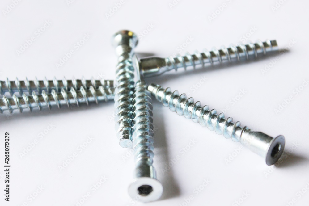 Screws on a white background Screws on a white background
