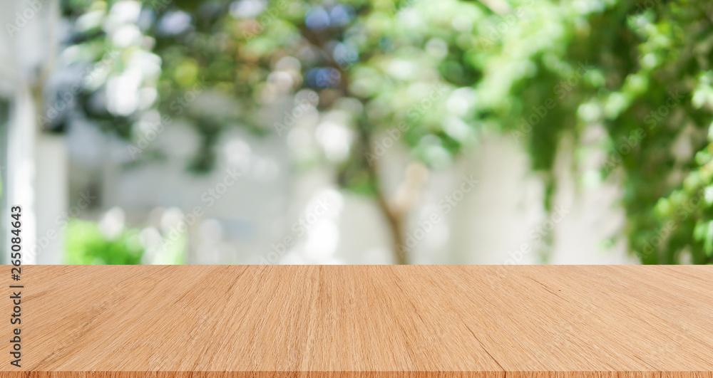 abstract blurred home garden with plank table for show,promote,ad product on image concept	
