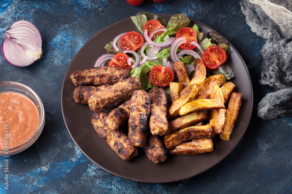 Kebapche or cevapcici, balkan minced meat kebab Kebapche or cevapcici, balkan minced meat kebab