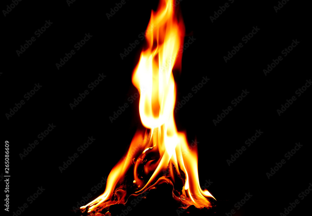 The fire that burns naturally during the night on a black background