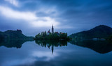 26 april 2019, Bled lake (Slovenia): early morning cloudy landscape of Lake Bled. In the center the island with the Church of the Assumption of Maria
