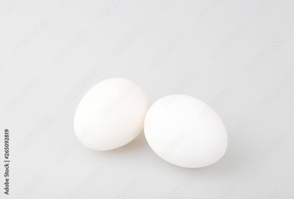 Close-Up Of Egg Over White Background Close-Up Of Egg Over White Background