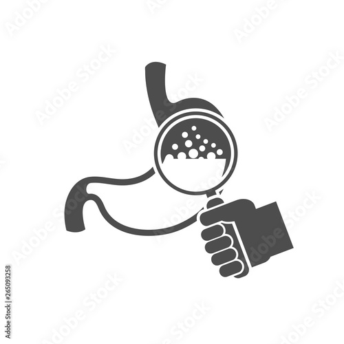 Stomach inspection icon concept. Hand holding magnifying glass over stomach