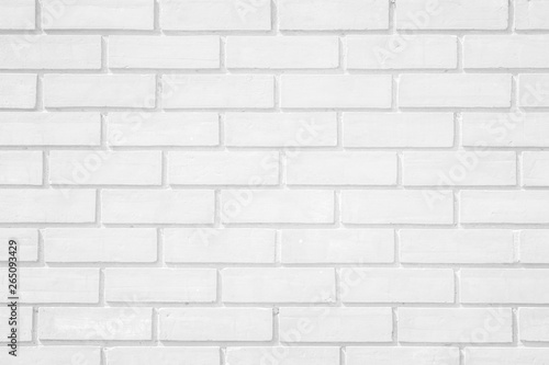 Wall white brick wall texture background. Brickwork or stonework flooring interior rock old pattern clean concrete grid uneven bricks design stack. © Phokin