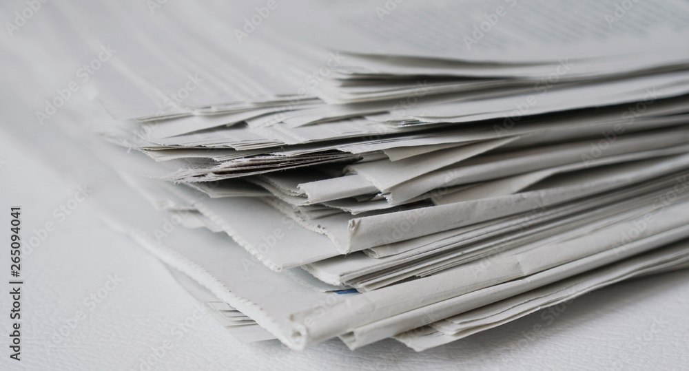 messy pile of newspapers or papers - news or paper recycling concept messy pile of newspapers or papers - news or paper recycling concept